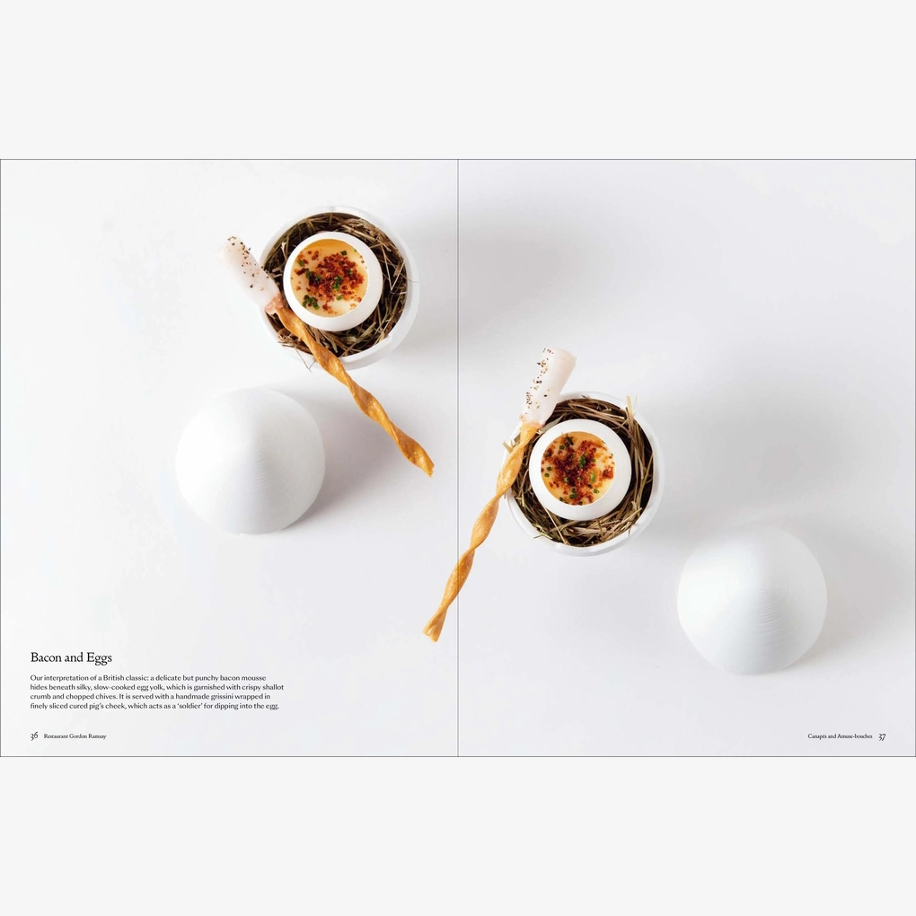 An interior spread showing a dish of bacon and eggs, beautifully prepared.